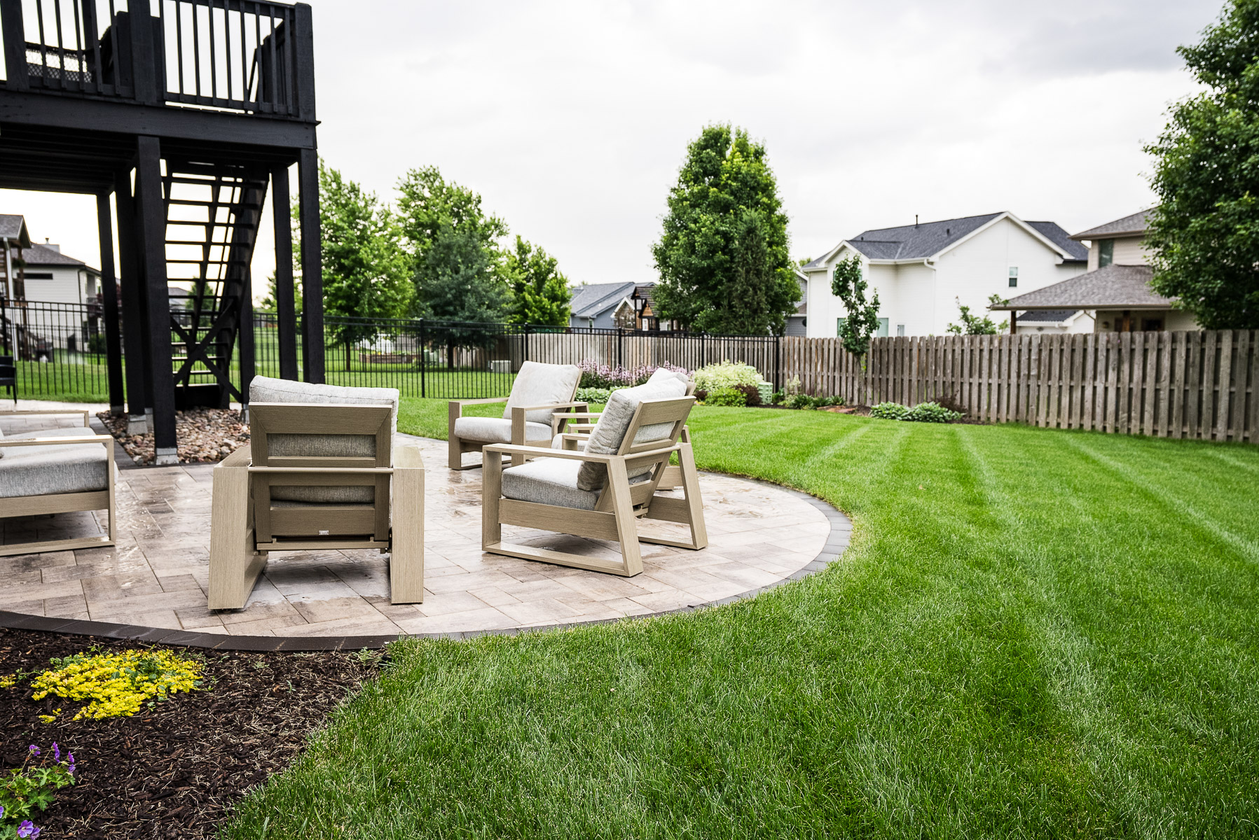 grass backyard patio seating firepit 2