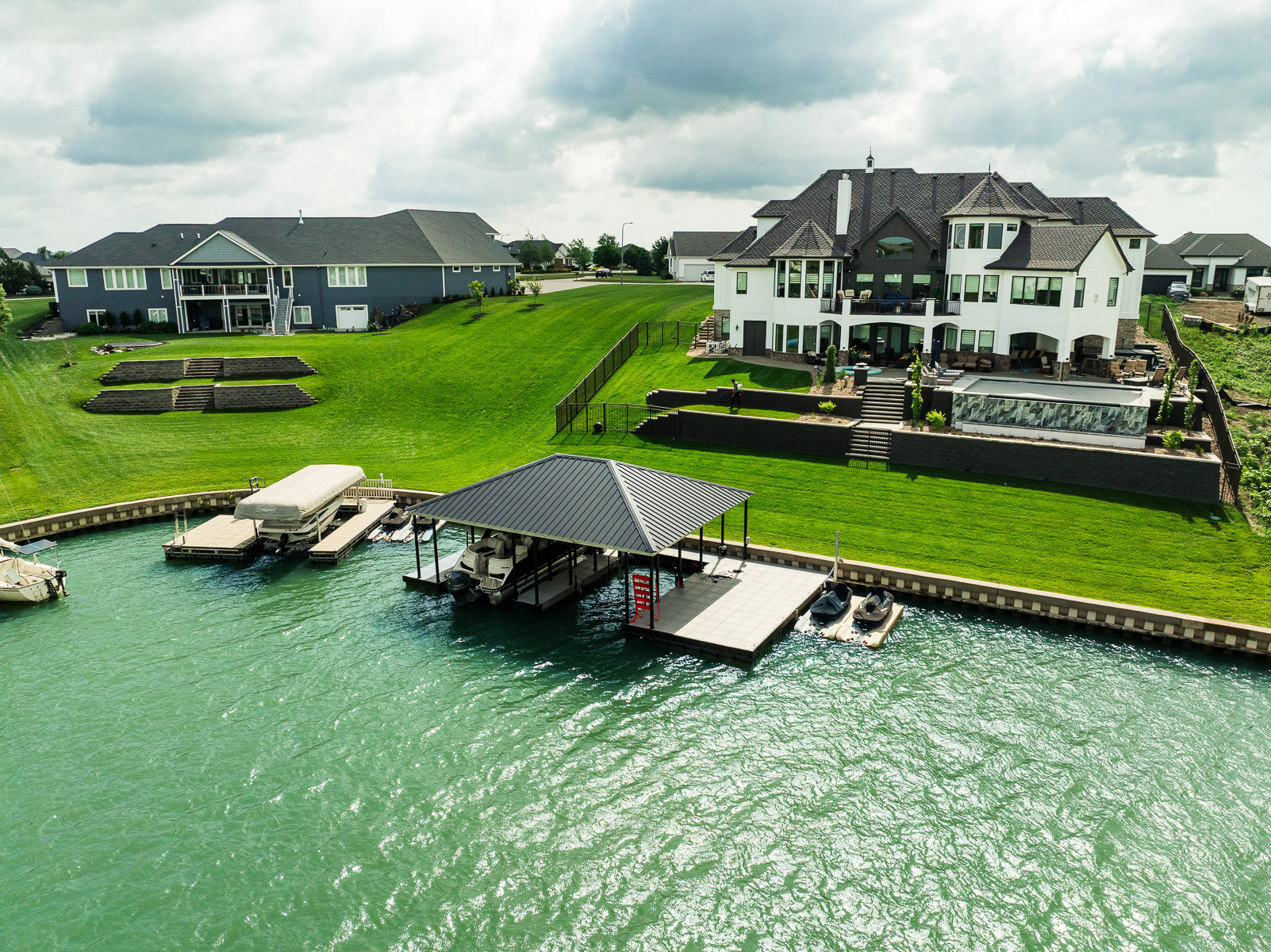 nice aerial dock marine pool infinity edge stars retaining wall home sloped